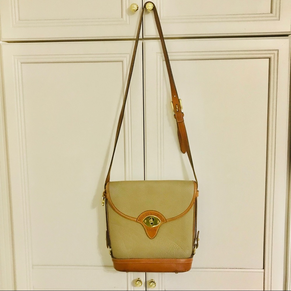 Vintage Dooney and Bourke taupe leather shoulder bag.